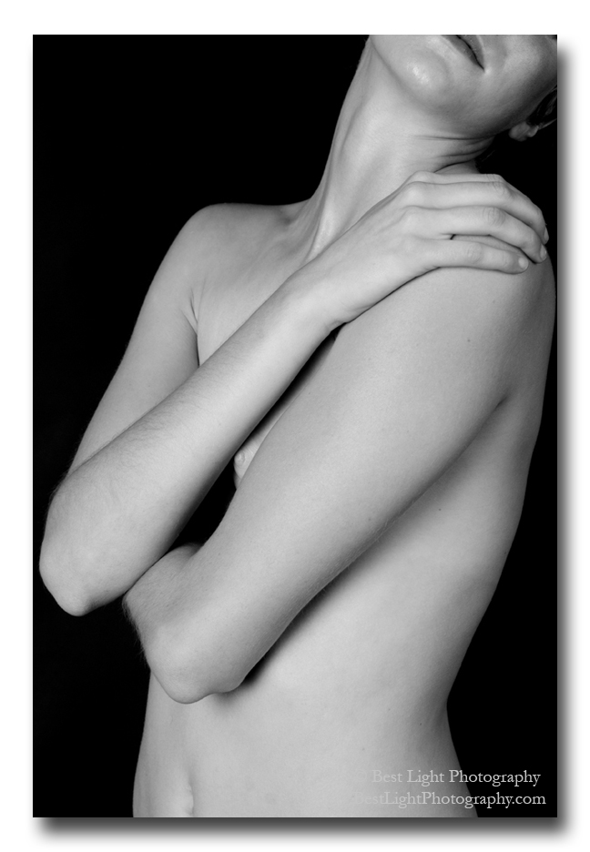black and white photograph nude female arms crossed
