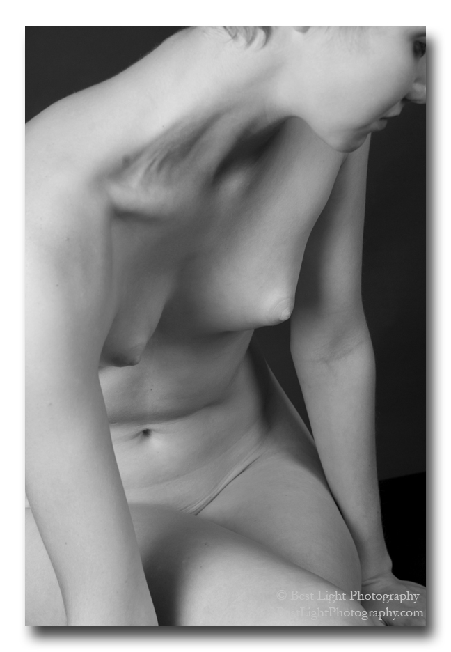 black and white photograph nude female seated