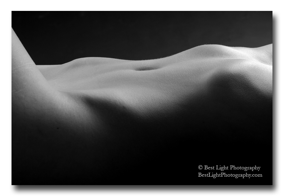 black and white photograph nude female belly