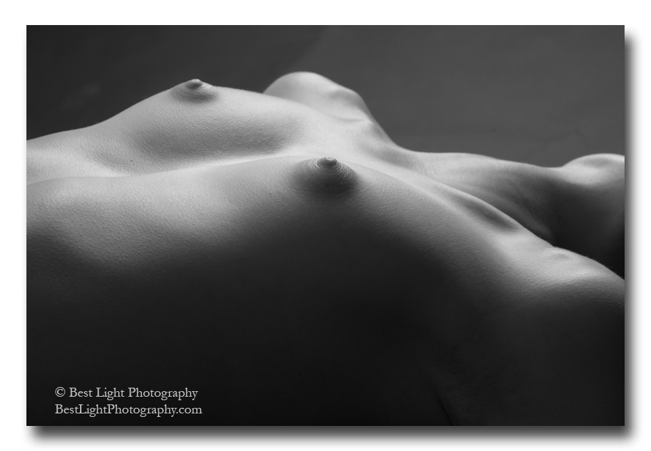 black and white photograph nude female breasts