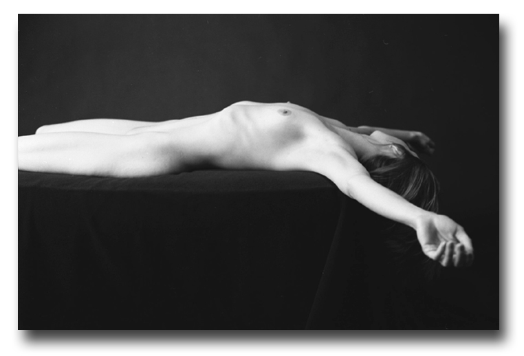 black and white photograph nude girl lying